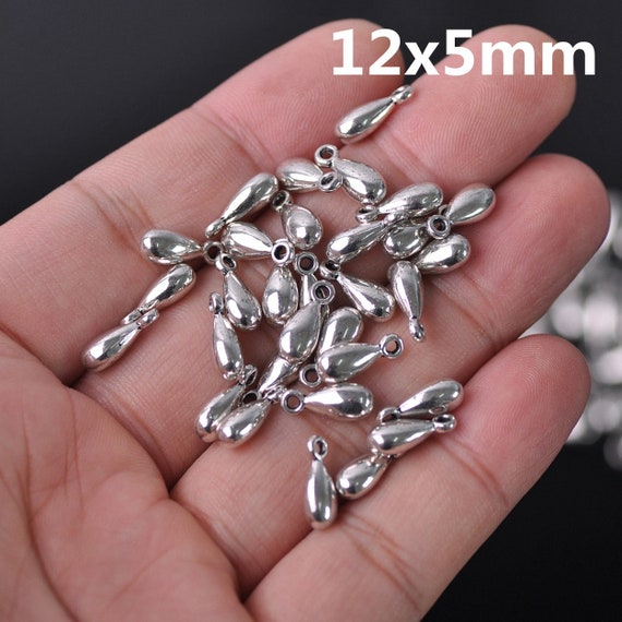 Metal teardrop beads discount