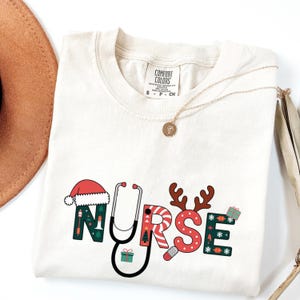 Christmas Nurse Shirt, Holiday Nurse Tee, Cute Medical Christmas Gift, Comfort Colors Nurse Christmas T-Shirt, RN Xmas Top