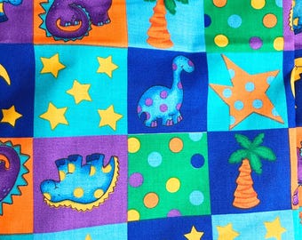 Colorful Dinosaur, Moon, Stars, and Polka Dot Fabric-Copyright 2000 Fabric Traditions