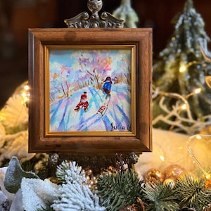 May include: A white ceramic mug with a black handle and the text "But First, Coffee" in a handwritten style. The mug is on a white surface. The mug is 4 inches tall.