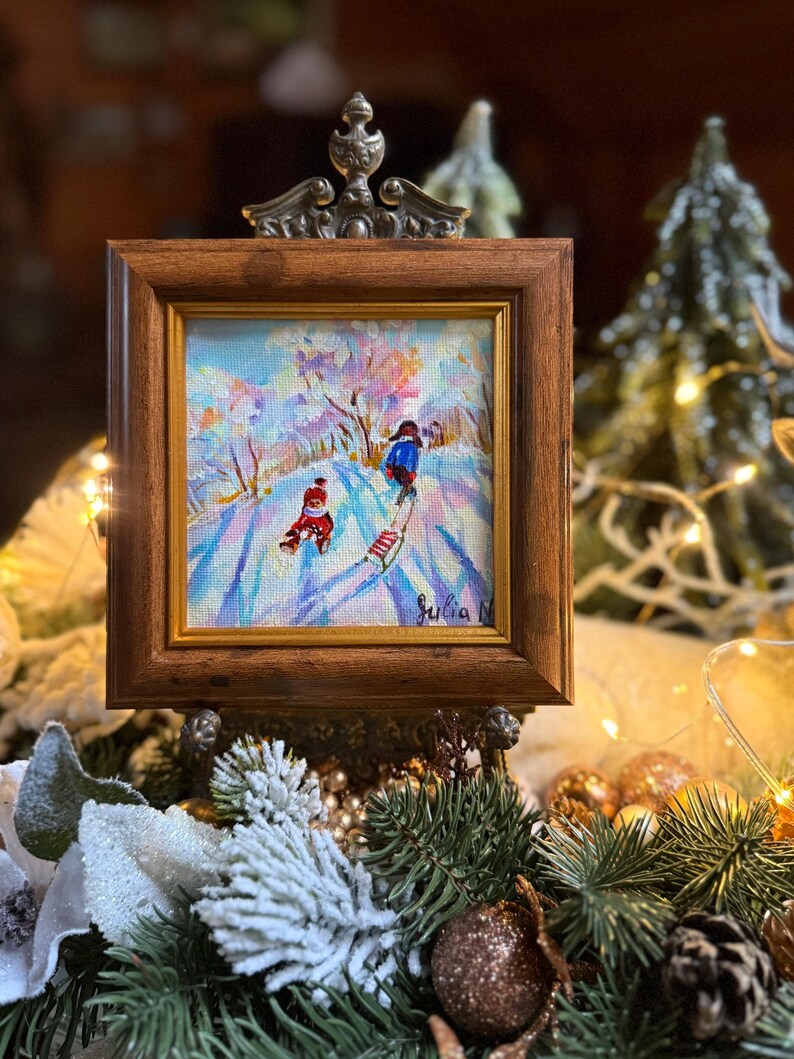 May include: A white ceramic mug with a black handle and the text "But First, Coffee" in a handwritten style. The mug is on a white surface. The mug is 4 inches tall.