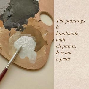 May include: A wooden artist's palette with various oil paint colors, including white, brown, and black. A paintbrush is dipped in white paint. Text on the right side reads: "The paintings is handmade with oil paints. It is not a print."