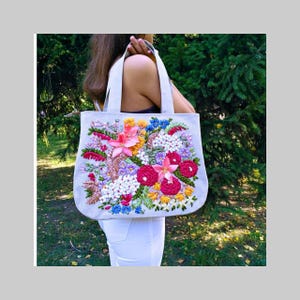 An elegant gift for Mother&#39;s Day: a handmade linen bag with floral accents and handmade trim. Made in Ukraine