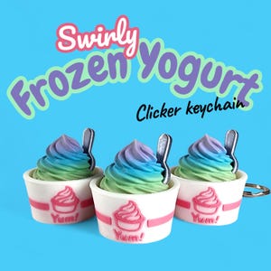 May include: Three Swirly Frozen Yogurt clicker keychains. Each keychain features a miniature yogurt cup with a colorful swirl of blue, green, and purple. A small spoon is inserted into each yogurt. The cups are white with a pink stripe and a pink yogurt graphic that says "Yum!"