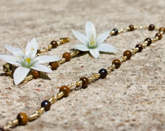 Super cute, summery, Tigers Eye gemstone necklace. Perfect to stack with simple gold chains, and to pair with other accessories.