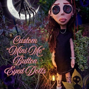 May include: A doll with long brown hair and large black button eyes, wearing a black dress and a silver necklace. The doll has visible tattoos on its arms and legs, and holds a small glowing lantern. Text reads: Custom "Mini Me" Button Eyed Dolls.
