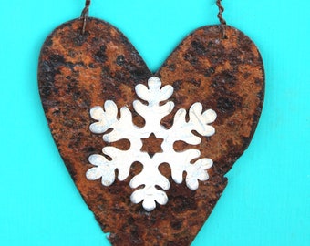 Christmas ornament - distressed white snowflake on rusty heart cut from galvanized metal