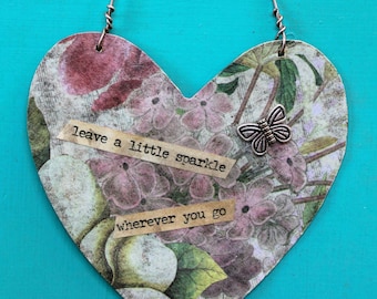 handmade hanging heart cut from distressed metal