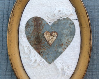 framed rusty hearts on vintage linen pieces