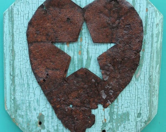 recycled decor - rusted heart with star cut from center on reclaimed wood