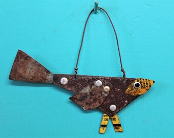 folk art bird made from rusted metal