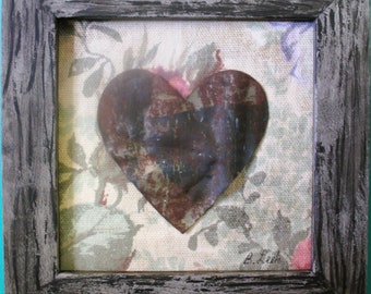 rusty heart on floral fabric in gray frame