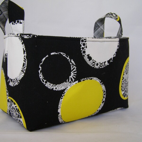 Reversible Fabric Bin - Large yellow and white circles with black and white floral patterns all on a black background 10 x 5.5 x 6