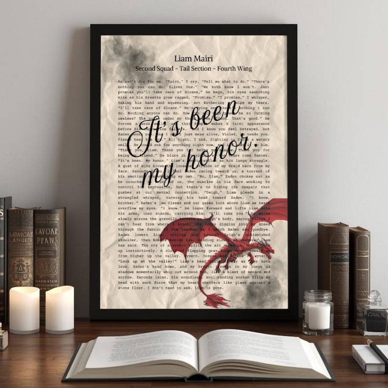 May include: A framed vertical print featuring a beige, textured background with printed text and a red dragon illustration. The text reads Liam Mairi, Second Squad, Tail Section, Fourth Wing, and the script phrase It's been my honor.