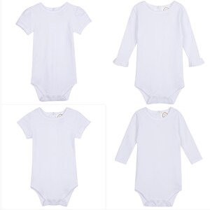 May include: Four white baby onesies, two with short sleeves and two with long sleeves. All onesies have a round neckline.