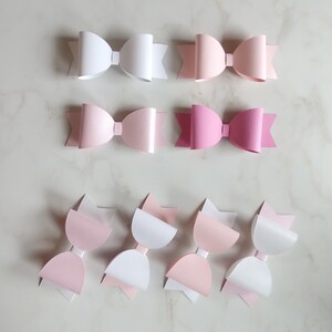 10 FIOCCHI ROSA - Fiocchi in cartoncino fatti a mano con biadesivo sul retro - Decorazioni feste, bomboniere, battesimo - 10 x 4,5 cm