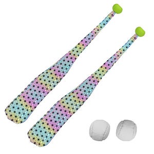 May include: Two baseball bats featuring a vibrant rainbow gradient background with a repeating black geometric star pattern and bright lime green end caps, accompanied by two plain white baseballs with visible stitching along the seams.