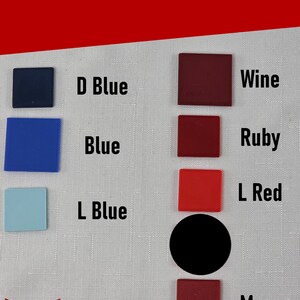 May include: A color chart titled Color Options featuring seven small squares and one circle in various shades. The labels include D Blue, Blue, L Blue, Wine, Ruby, L Red, and Mars. The bottom left corner displays a red torii gate logo and the text Silver Harmony Studios LLC.
