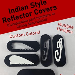 May include: Five black oval-shaped reflector covers with various white cut-out designs, including a headdress silhouette and swirling patterns. Text on the image reads: Indian Style Reflector Covers, Compatable part numbers in listing description, Custom Colors!, Multiple Designs.