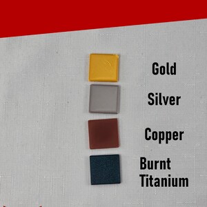 May include: A color options chart displaying four square tiles in gold, silver, copper, and burnt titanium. The text reads Color Options, Gold, Silver, Copper, Burnt Titanium, and Silver Harmony Studios LLC with a red torii gate logo at the bottom.