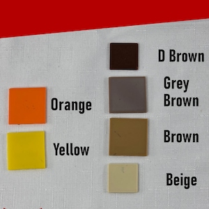 May include: A color chart displaying six square samples labeled with text: Orange, Yellow, D Brown, Grey Brown, Brown, and Beige. The header reads Color Options and the bottom includes the text Silver Harmony Studios LLC.