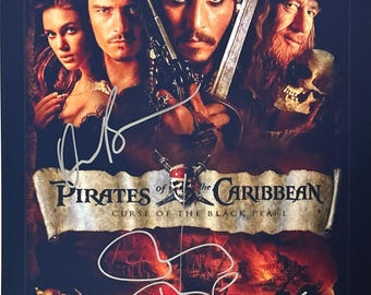 キーラ・ナイトレイのサイン入りパイレーツ・オブ・カリビアン写真