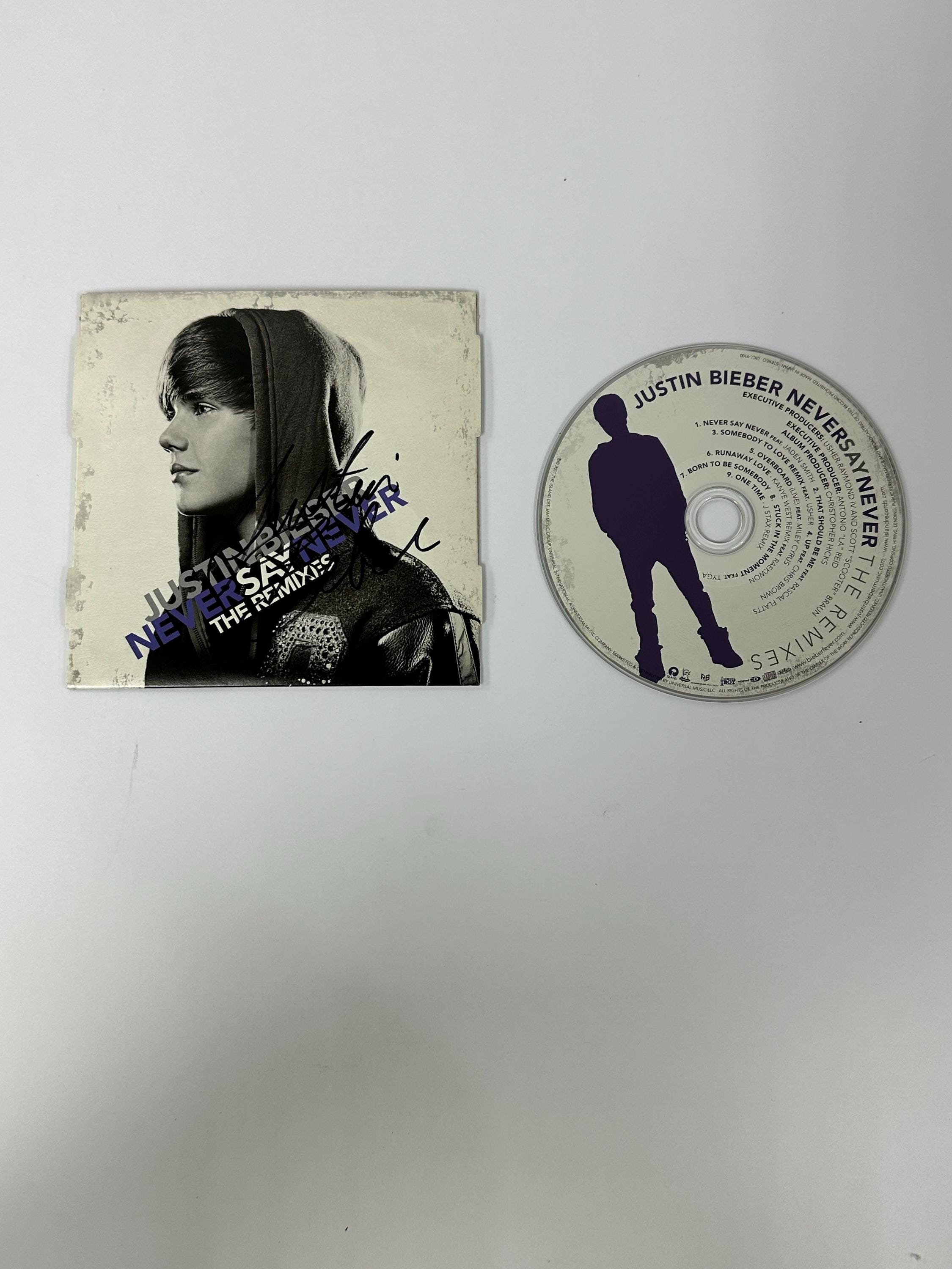 ジャスティン・ビーバーのサイン入りCD - Etsy 日本