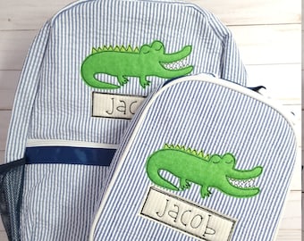 alligator print backpack