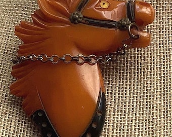 Vintage mid century butterscotch Bakelite ornate horse head pin brooch