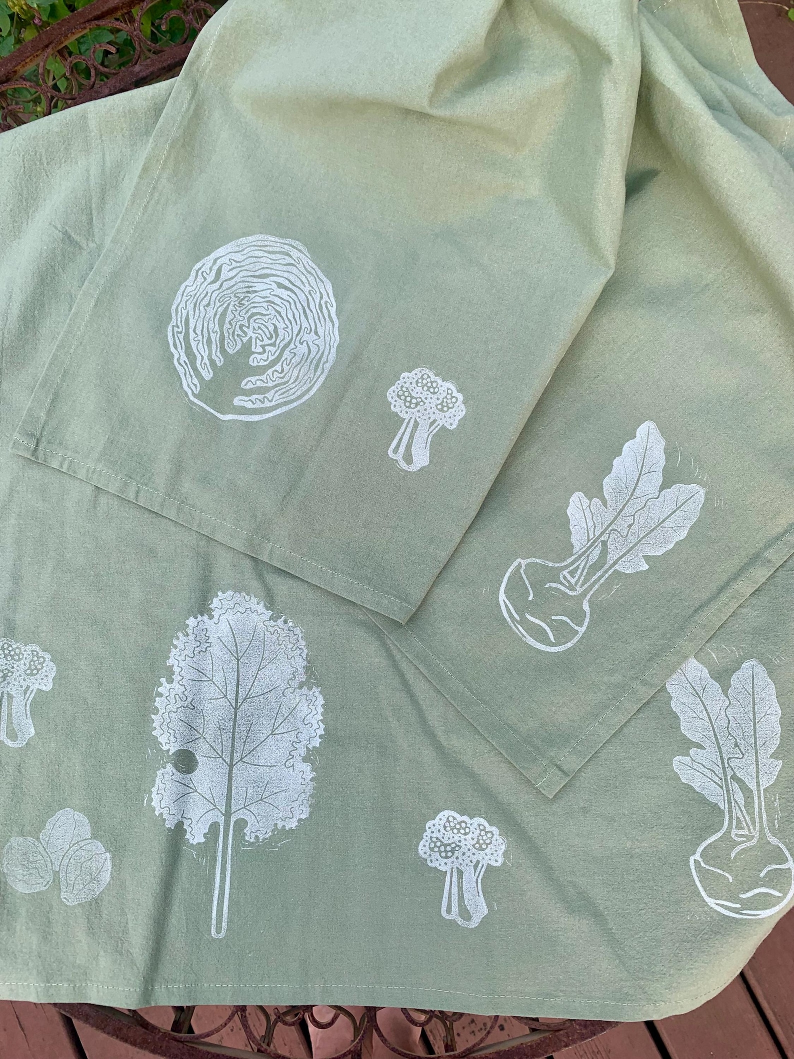 hand-printed kitchen towels featuring cabbage, broccoli, kohlrabi, brussel sprouts, and kale
