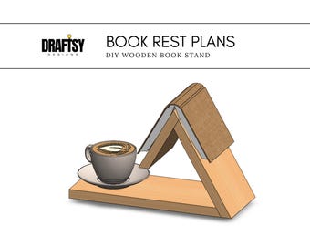 May include: DIY plans for a wooden book stand. The stand is shaped like a triangle with a book rest on top. A cup of coffee is on a small shelf below the book rest.