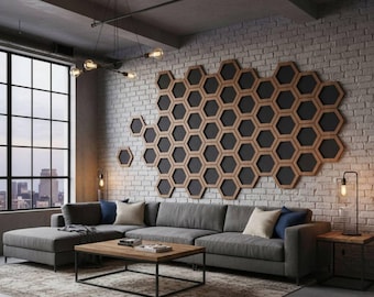 May include: A modern living room with a gray sectional sofa, a wooden coffee table, and a patterned rug. The focal point is a wall decorated with a honeycomb design. The room has a large window with a city view and industrial-style lighting.