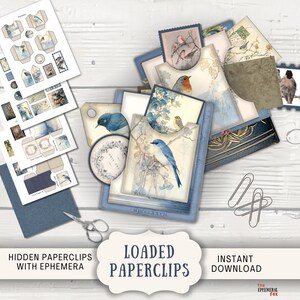 May include: A collection of ephemera, including paperclips, tags, and printed sheets, featuring bird illustrations in shades of blue and beige. The image includes scissors and paper. The text on the image says "LOADED PAPERCLIPS".