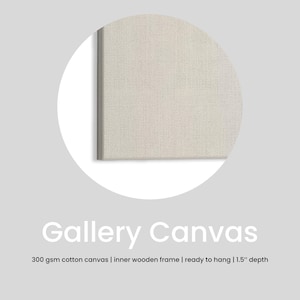 May include: A close-up of a gallery canvas with a textured, off-white surface. The text "Gallery Canvas" is displayed in a soft grey font. The description also includes "300 gsm cotton canvas | inner wooden frame | ready to hang | 3.8 cm depth."