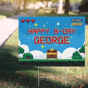 May include: A blue and green pixelated birthday sign with the text "Happy B-Day George" and a score of 18500. The sign features a pixelated treasure chest with gold coins.