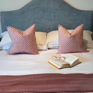 Pair of Fermoie Eythorne cushions with striped blue piping