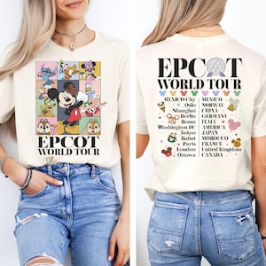 May include: A beige t-shirt with a colorful graphic of Mickey Mouse and other Disney characters on the front. The back of the shirt has the text "EPCOT WORLD TOUR" and a list of countries and cities.