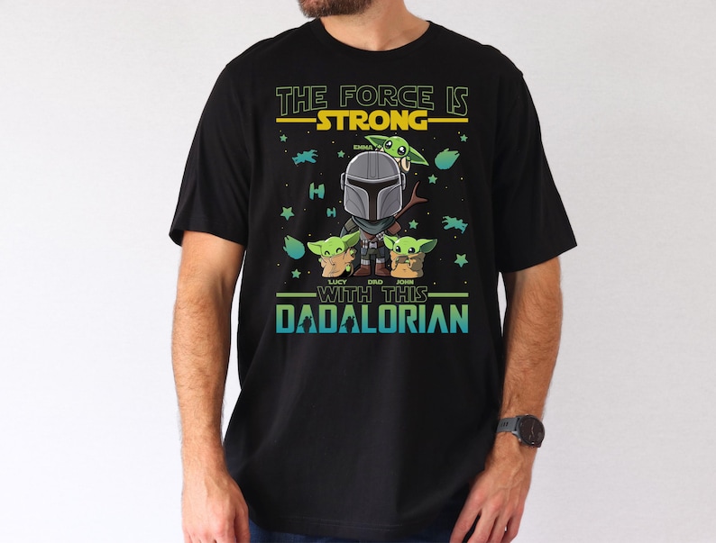 Personalized The Force Is Strong With This Dadalorian Shirt, Mandalorian Dad T-Shirt With Kids Names, Star Wars Father Day Tees Gift