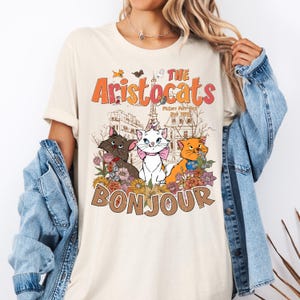 Camiseta Disney The Aristocats Bonjour, Blusa Aristocats em Paris, Camiseta Floral Disney Aristocats, Camiseta Marie Cat, Suéter Viagem em Família à Disneylândia