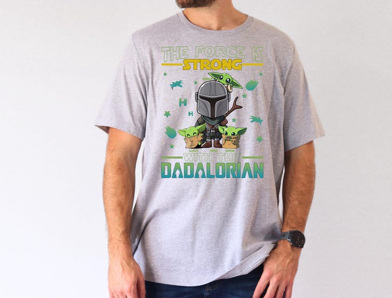 Personalized The Force Is Strong With This Dadalorian Shirt, Mandalorian Dad T-Shirt With Kids Names, Star Wars Father Day Tees Gift