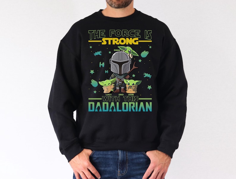 Personalized The Force Is Strong With This Dadalorian Shirt, Mandalorian Dad T-Shirt With Kids Names, Star Wars Father Day Tees Gift