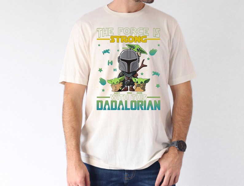 Personalized The Force Is Strong With This Dadalorian Shirt, Mandalorian Dad T-Shirt With Kids Names, Star Wars Father Day Tees Gift