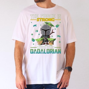 Personalized The Force Is Strong With This Dadalorian Shirt, Mandalorian Dad T-Shirt With Kids Names, Star Wars Father Day Tees Gift