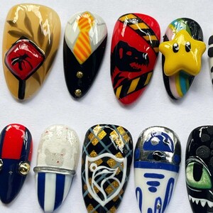 geek press on nails, movie character nails, cosplay nail art set, dragon nails, character press on nails, geek nail art, movie inspired nails, game inspired nails, custom cosplay nails, fan art nail set, unique press on nails, collector nail art, custom nerd nails