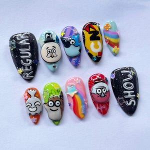 cartoon press on, 3d nail art, handmade nails, anime nail design, colorful false nails, cute cosplay nails, fun nail art, kawaii press on, cartoon nail gift, unique nail art, playful nails, animation nails, handmade gift