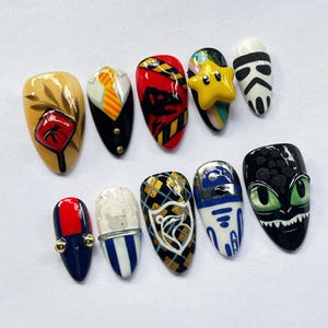 geek press on nails, movie character nails, cosplay nail art set, dragon nails, character press on nails, geek nail art, movie inspired nails, game inspired nails, custom cosplay nails, fan art nail set, unique press on nails, collector nail art, custom nerd nails