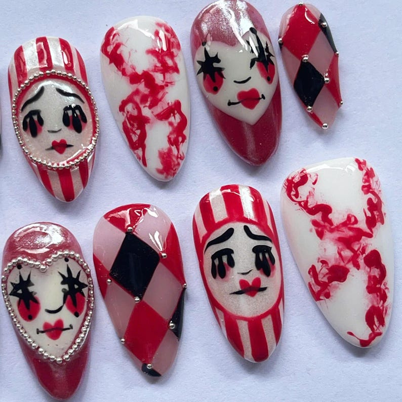 halloween press on nails, creepy clown fake nails, harlequin nail art, red black white nails, spooky costume nails, handmade halloween nails, circus clown nails, cosplay press on nails, gothic carnival nails, party fake nails set, scary clown nail art, unique halloween nails, spooky cosplay nails, holiday nails, canival nails, party nails