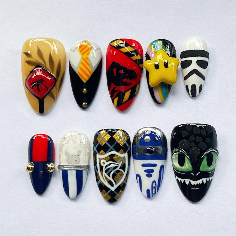 geek press on nails, movie character nails, cosplay nail art set, dragon nails, character press on nails, geek nail art, movie inspired nails, game inspired nails, custom cosplay nails, fan art nail set, unique press on nails, collector nail art, custom nerd nails