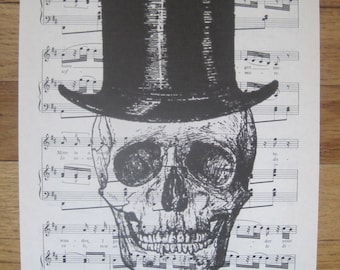 spooky skull with top hat on vintage sheet music