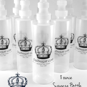 May include: Eight 8-ounce clear plastic squeeze bottles with white caps and a crown logo. The bottles are labeled "OuiSugar.com Keeping Life Sweet Since 1985".